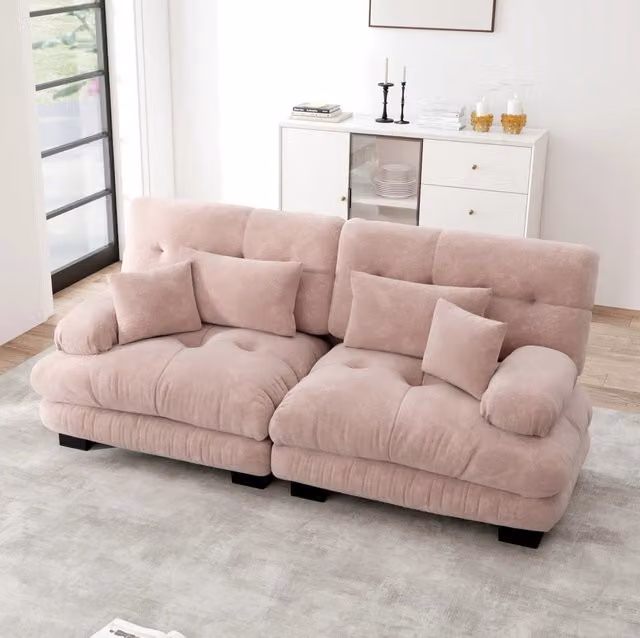 Divano modulare in ciniglia rosa con cuscini lombari e decorativi