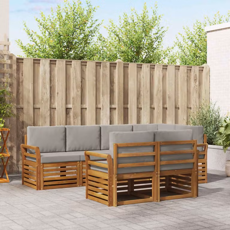 Set di divani da esterno vidaXL a forma di L composto da 7 pezzi in legno di acacia con cuscini, colore naturale e grigio chiaro