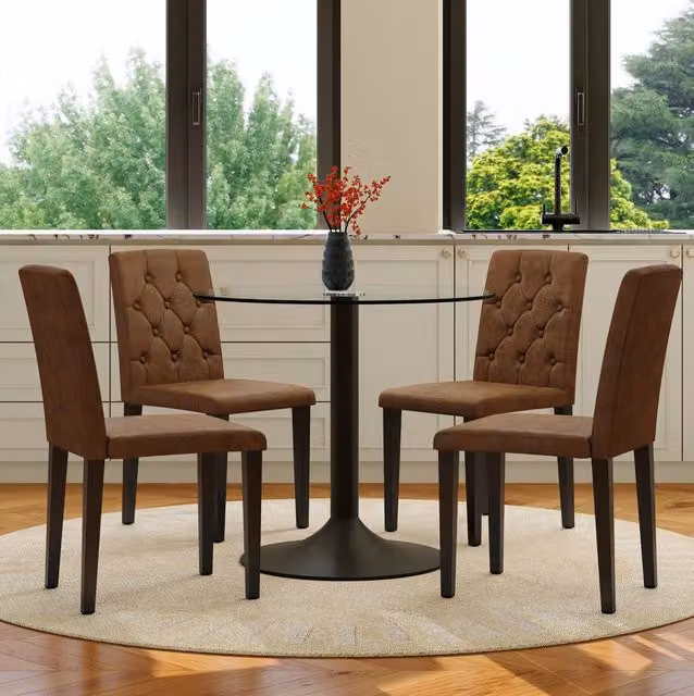 Set da pranzo moderno con tavolo rotondo in vetro Ø 85 cm e 4 sedie in similpelle marrone retrò