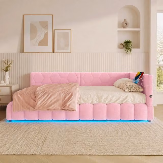 Letto da giorno MODFU in tessuto rosa con base contenitore a sollevamento idraulico, illuminazione LED sottostante e porte di ricarica USB, L/P/H: 90 x 200 cm