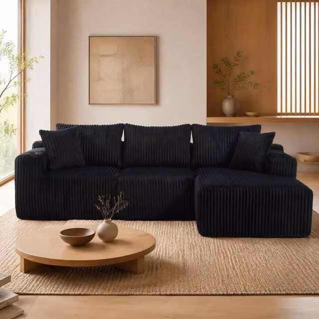 Divano modulare con chaise longue e modulo 2 posti; velluto a coste nero; 5 cuscini