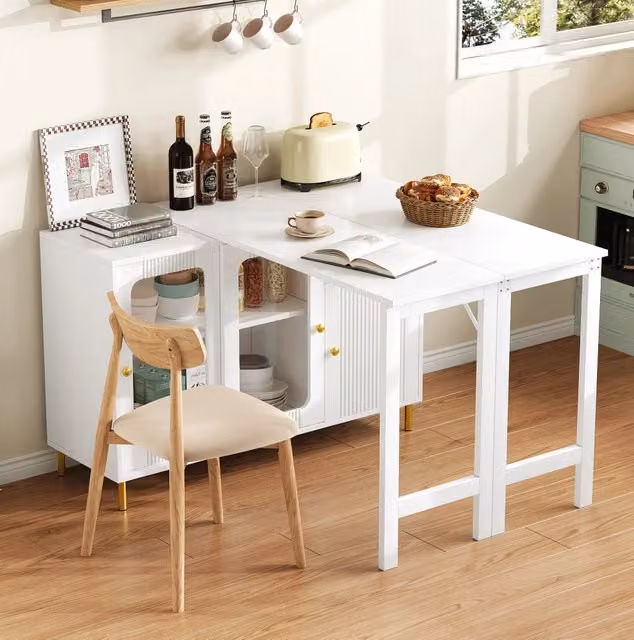 Credenza ULEVR 116x40x78,5 cm con piano estensibile fino a 122x80 cm, ante scorrevoli in vetro, bianca