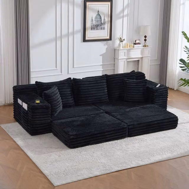 Divano letto modulare in tessuto effetto velluto con schienale alto, tasche laterali e portabicchieri nero
