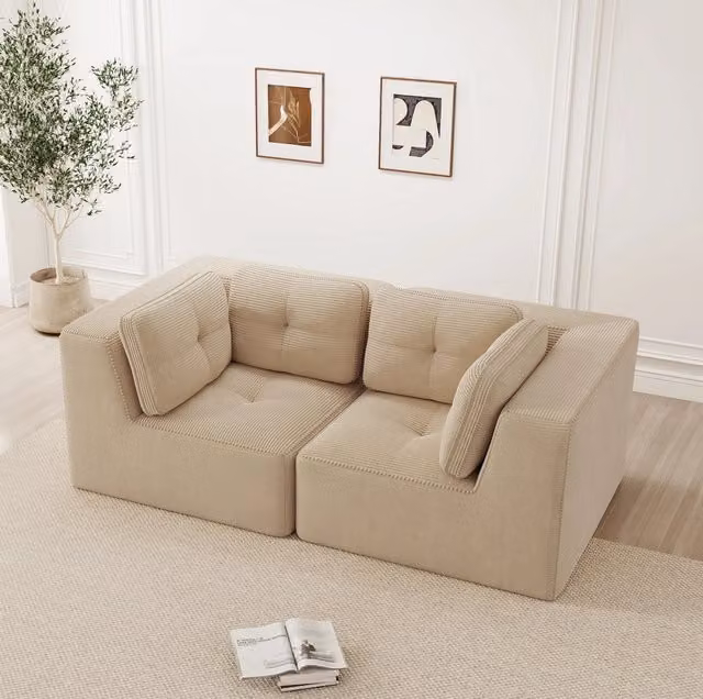Divano angolare modulare beige in velluto a coste; senza struttura rigida