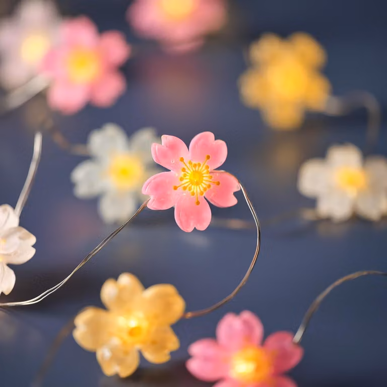 Catena luminosa a forma di fiori, con 20 LED bianco caldo, timer, lunghezza 150 cm, alimentazione a batteria
