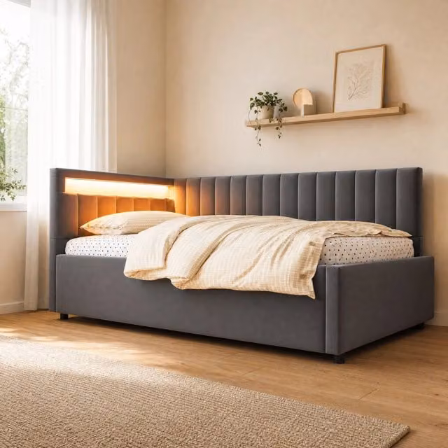 Letto da giorno imbottito ULEVR 90x200 cm con vano contenitore idraulico, LED e rivestimento in velluto grigio