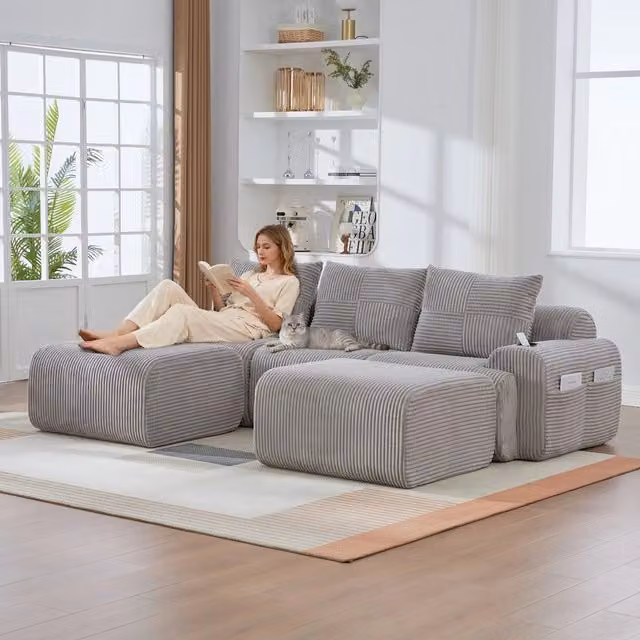 Divano 3 posti con poggiapiedi ¨C Minimal ¨C grigio chiaro tessuto con contenitori e portabibite