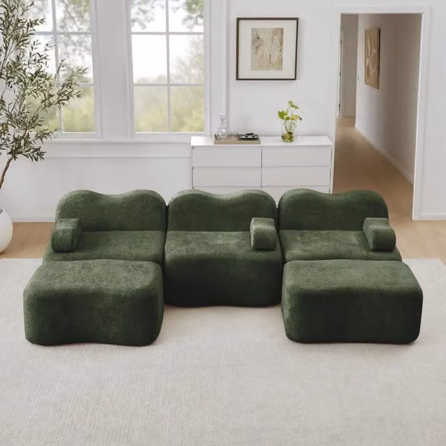 Divano angolare modulare a u 3 posti senza struttura con seduta profonda e pouf collegabili in velluto verde