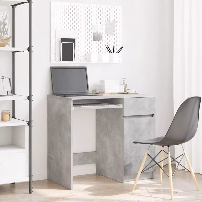 Scrivania in grigio cemento con piano stabile e spazio contenitivo