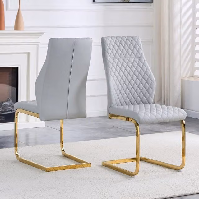 Set di 2 sedie da pranzo Zephmum con schienale alto, rivestimento in ecopelle grigia con motivo geometrico e struttura metallica dorata lucida