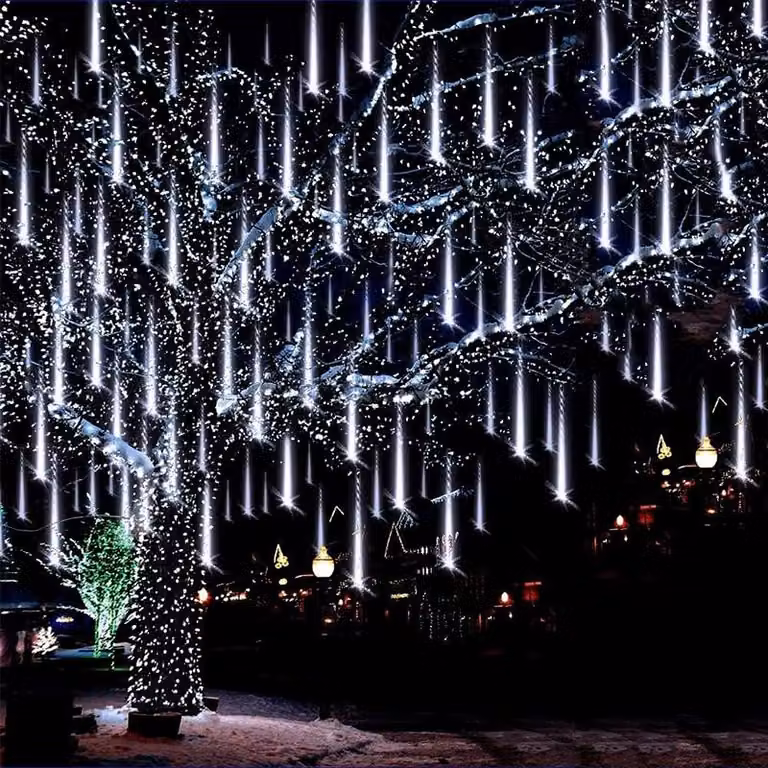 Catena luminosa a LED effetto "pioggia di meteoriti", impermeabile, per uso esterno, ideale per decorazioni natalizie, matrimoni, feste, giardini e alberi. Lunghezza 50 cm, 8 tubi luminosi, luce bianca