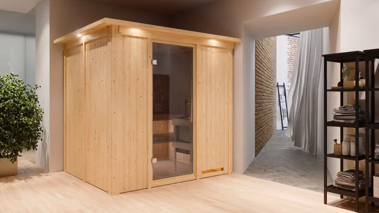 Sauna Sodin: con cornice luminosa sul tetto: in legno naturale: 9 kW, sauna finlandese + centralina Easy Finnisch: grafite, porta interamente in vetro. Colore: legno naturale. Cornice luminosa sul tetto: con cornice luminosa. Stufa per sauna: 9 kW, sauna