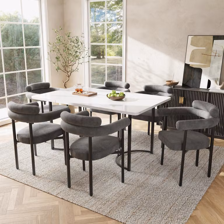 Set da pranzo Fortuna Lai (7 pezzi), con gambe da tavolo in metallo dal design elegante, comprensivo di 6 sedie grigie rivestite in ecopelle, dallo stile raffinato e confortevole, ideale per ristoranti