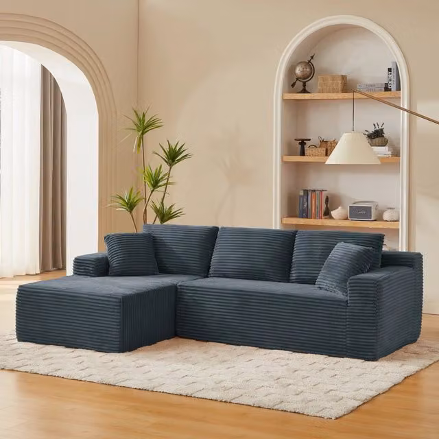 Divano modulare a L con 4 configurazioni in tessuto traspirante e cuscini collo grigio scuro 252,5 × 163 × 65 cm