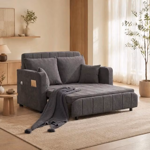 Divano letto in ciniglia grigia; 139 × 83 × 58 cm; con tasca portaoggetti e 4 cuscini