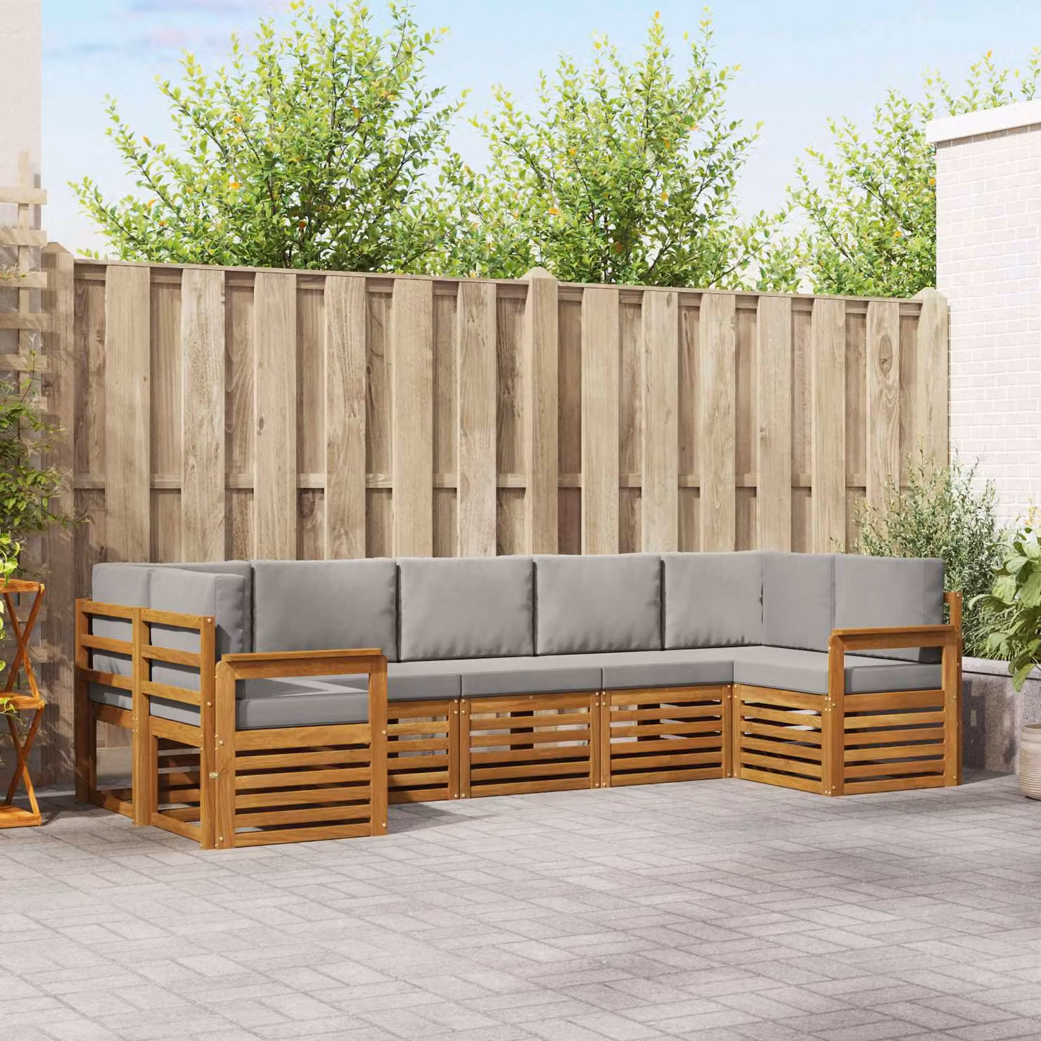 vidaXL Set di divani da esterno a L composto da 7 pezzi in legno di acacia con cuscini beige e grigio