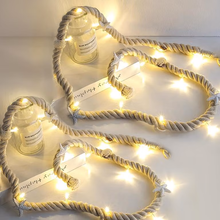 Catena luminosa a LED, 15 LED bianco caldo, con decorazioni a forma di conchiglie e stelle marine, lunghezza 1,5 metri, confezione da 2 pezzi