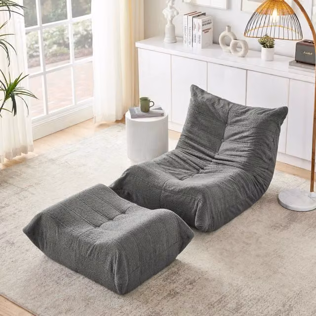 Poltrona relax con poggiapiedi e schienale reclinabile per lettura e riposo, in tessuto effetto peluche grigio