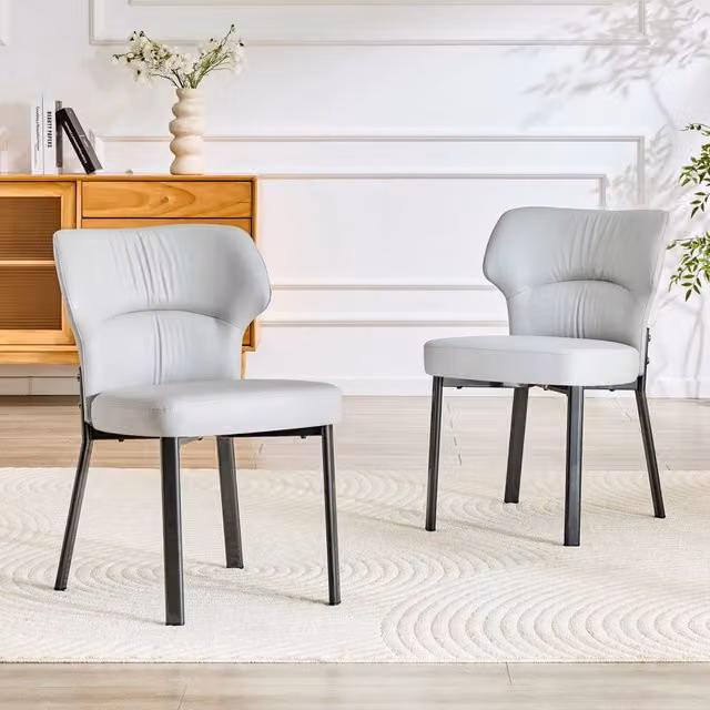 Set di 2 sedie da pranzo OKWISH in ecopelle grigia con struttura in metallo nero e seduta imbottita