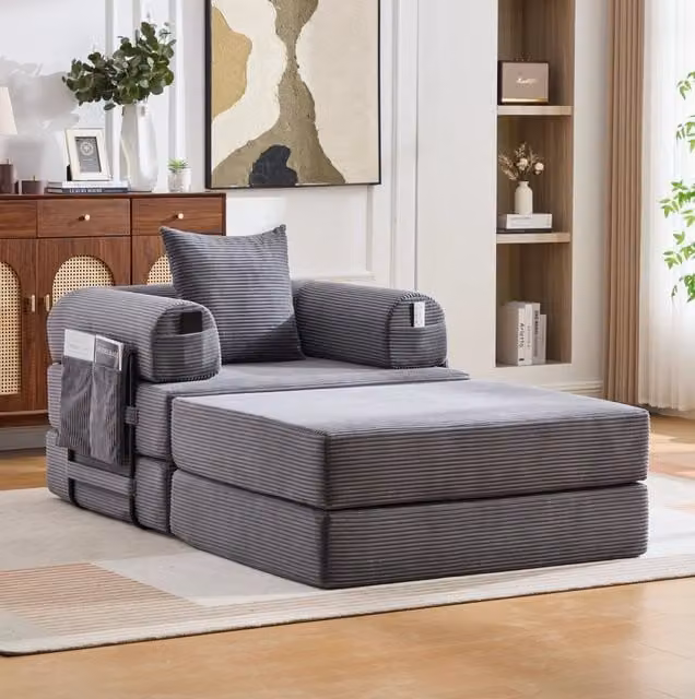 Poltrona letto modulare ULEVR 112x190x67 cm con pouf, cuscino e tasca laterale, velluto a coste grigio scuro