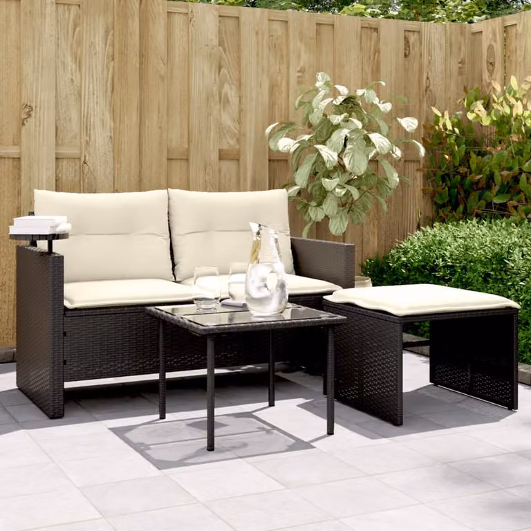 Set da giardino vidaXL in polyrattan nero con divano a L, tavolino e pouf con cuscini bianchi