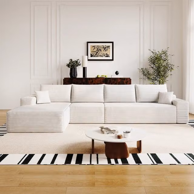 Divano angolare modulare a L 340x175x83 cm - senza montaggio con seduta profonda e chaise longue - velluto a coste - bianco