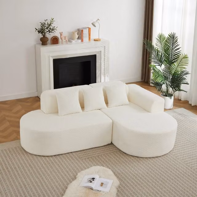 Divano angolare a L moderno in tessuto chenille color crema, versione destra con chaise longue e 3 cuscini schienale, design arrotondato per soggiorno