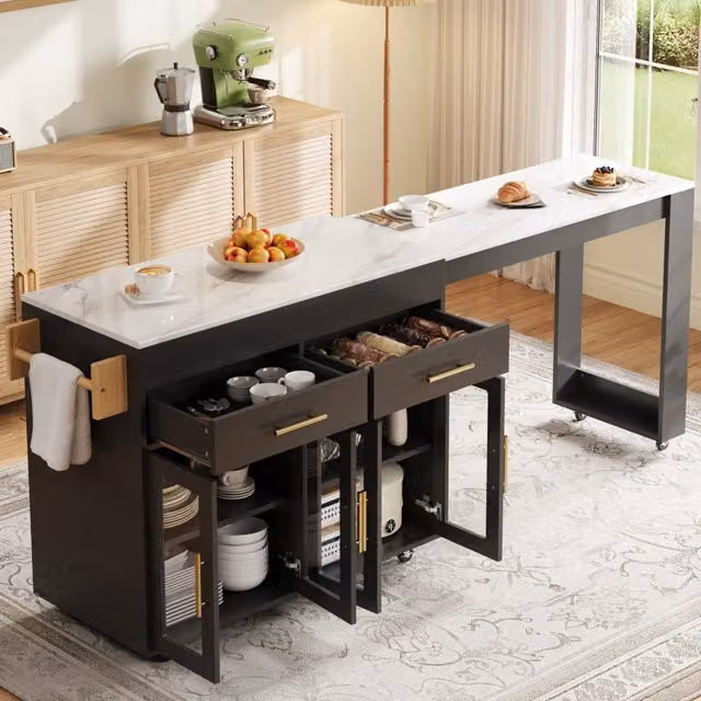 Isola da cucina mobile con piano estraibile fino a 217 cm; ante in vetro e cassetti; nero; 132;5-217x50x93 cm