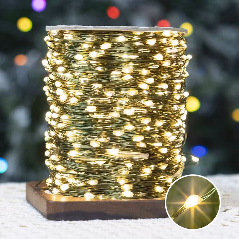 Catena luminosa da 30 metri, con 300 LED, luce bianco caldo, dotata di telecomando e timer