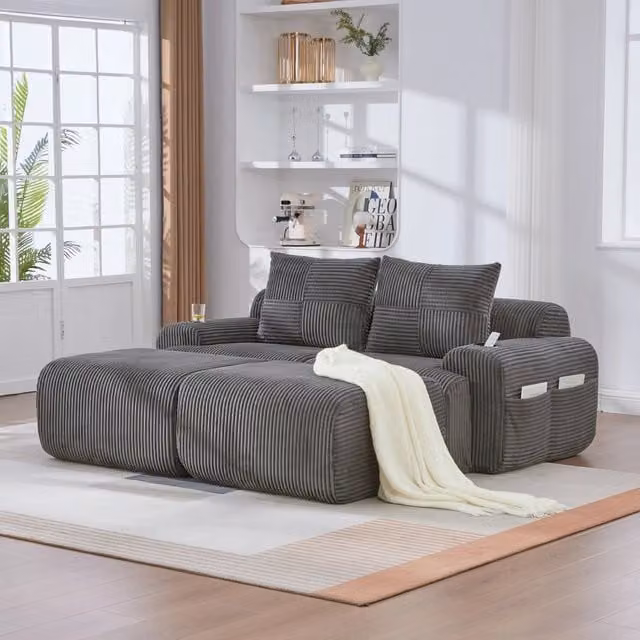 Divano angolare a L Mivray in velluto a coste grigio con pouf coordinato e portabevande L/P/H: 200 x 174 x 80 cm – 1