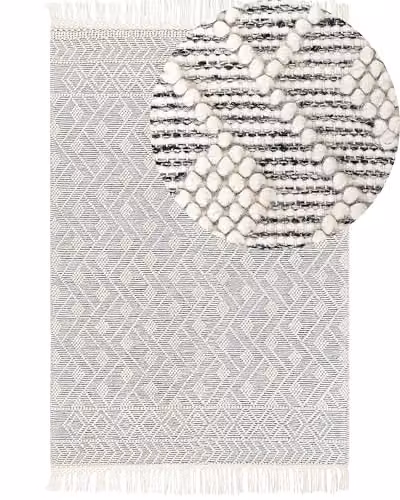 Beliani Tappeto da salotto in lana con frange decorative 160 x 230 cm in bianco e nero