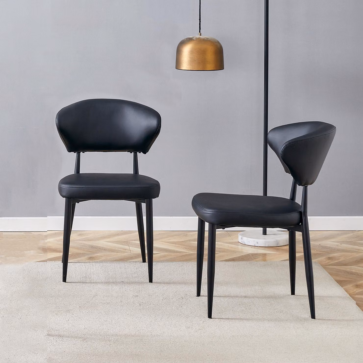 Sedia da pranzo minimalista e nera, dal design ergonomico e con schienale curvo, offre un'esperienza di seduta nuova, caratterizzata da comfort e semplicità. Confezione da 2 sedie. Colore: nero
