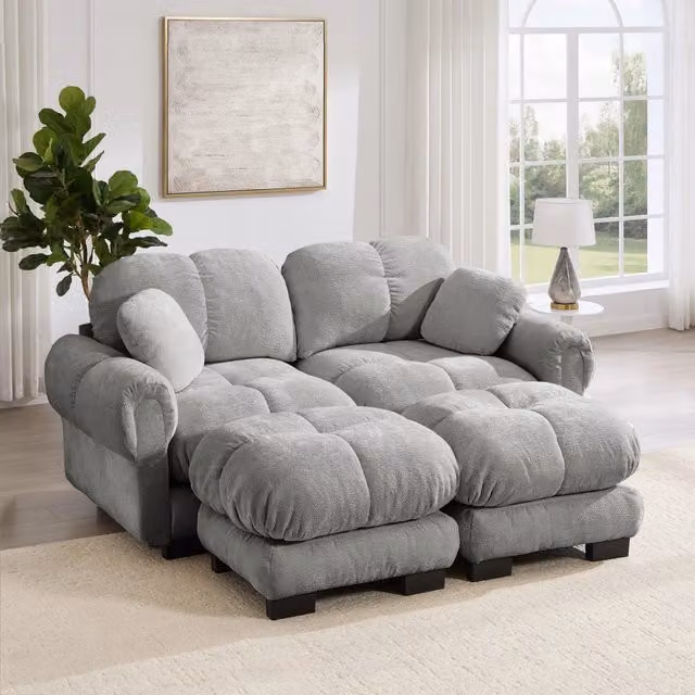 Divano modulare 190.0x149.0x90.0 cm con cuscini trapuntati e pouf mobili in ciniglia grigio chiaro