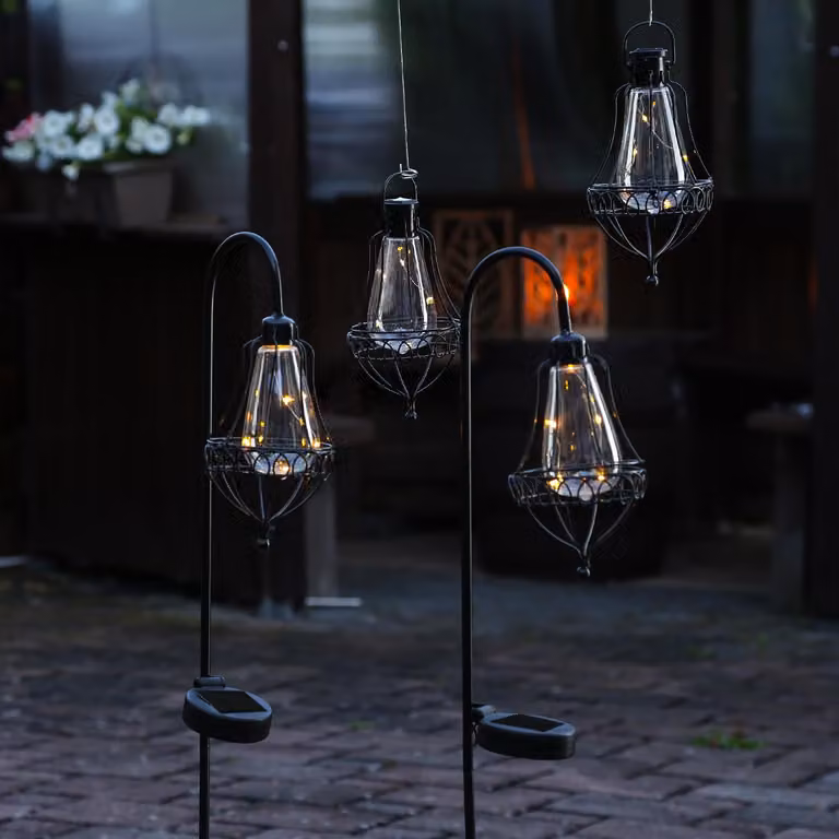 Lanterne solari a LED e spine da giardino - due maniglie e due picchetti da terra - diametro: 10 cm - nere - set da 4