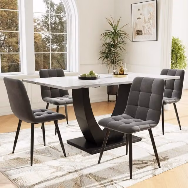Set da pranzo Minimal composto da tavolo allungabile con piano bianco effetto marmo e 4 sedie in velluto grigio con gambe nere