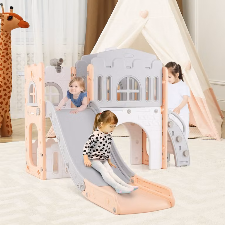Scivolo per bambini 9 in 1 Costway con canestro da basket e spazio di archiviazione, scivolo da interno in plastica per bambini dai 12 mesi in grigio e rosa