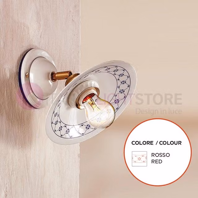 Applique da parete orientabile Fiesole di Ceramiche Borso in ceramica e ottone stile rustico con decori rossi