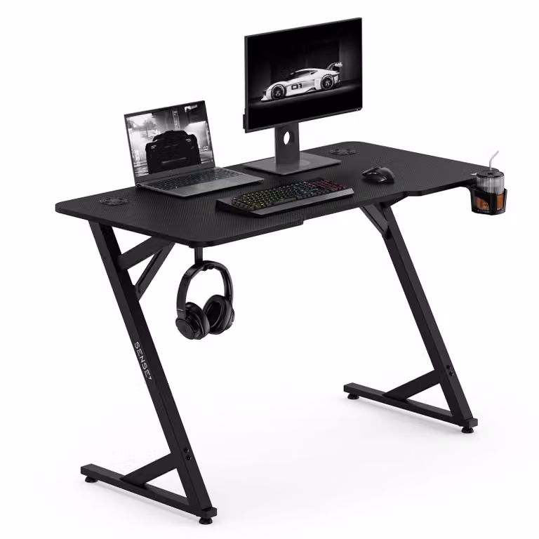 Sense7 VAMO, scrivania da gaming, 120x60 cm, nera, per computer, PC, design a forma di Z, con portabicchieri, ideale per l'ufficio domestico e l'ambiente lavorativo
