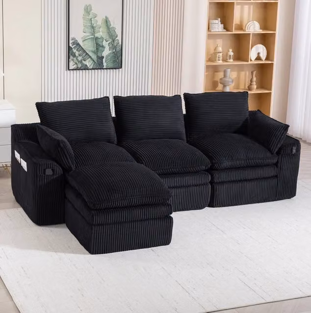 Divano modulare in velluto a coste con pouf e tasche laterali; 263 x 167 x 85 cm; nero