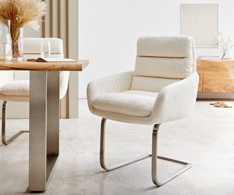 DELIFE Sedia a dondolo Abelia-Flex con braccioli, rivestita in tessuto bouclé bianco. Sedia a dondolo dal design minimalista, struttura in acciaio inossidabile