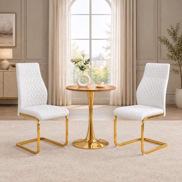 Set tavolo e sedie con tavolo rotondo bianco e oro
