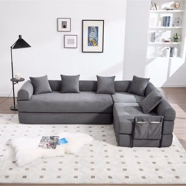 Divano modulare con funzione letto, tasca laterale e moduli combinabili in velluto a coste grigio scuro