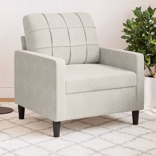 Poltrona moderna in velluto beige con braccioli e struttura in metallo per il tuo soggiorno
