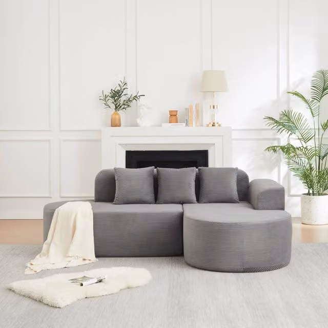 Divano angolare 220.0x155.0x70.0 cm con chaise longue curva in velluto a coste grigio