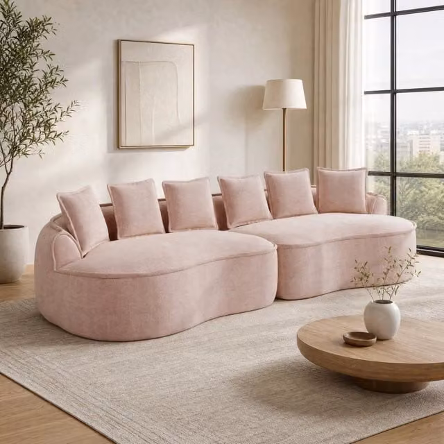 Divano modulare senza struttura in tessuto chenille rosa; con chaise longue profonda e cuscini