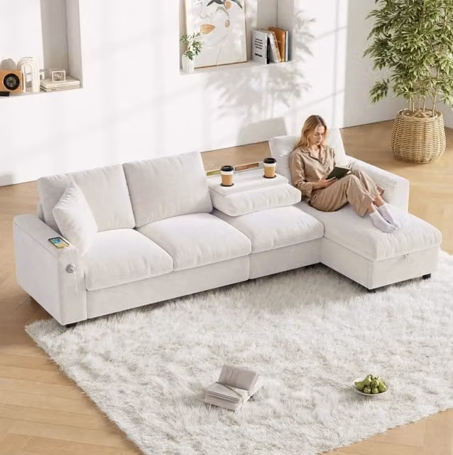 Divano letto angolare reversibile in ciniglia beige con tavolino; USB e Type-C
