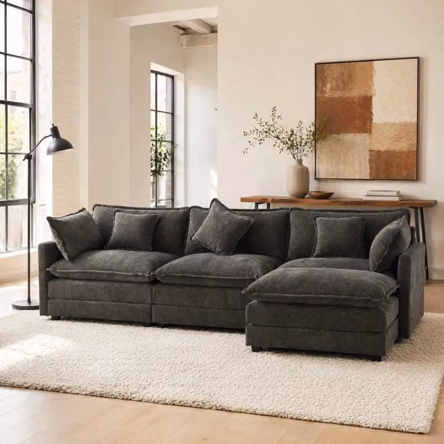 Divano angolare REDOM in tessuto grigio con pouf mobile reversibile L 283 x 147 x 84 cm