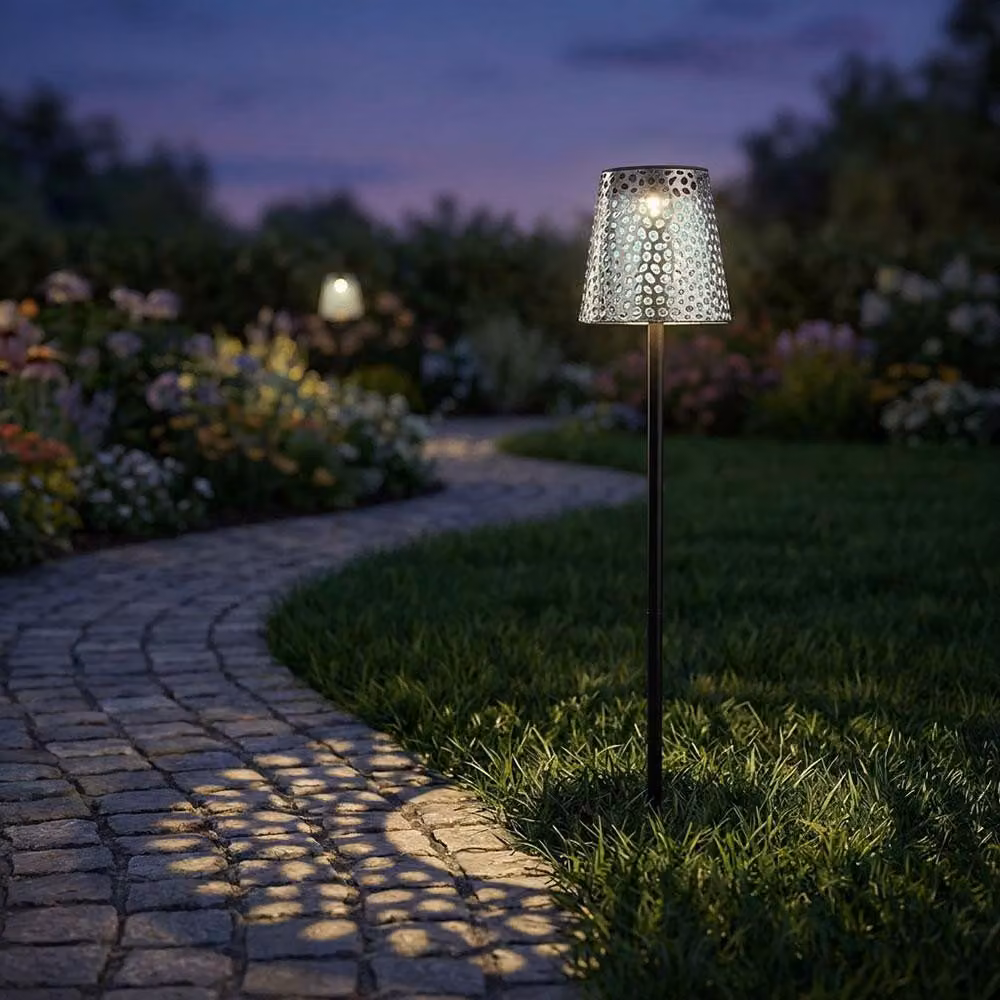 Lampada solare a LED, metallo, nera, con motivi decorativi traforati, H 70 cm