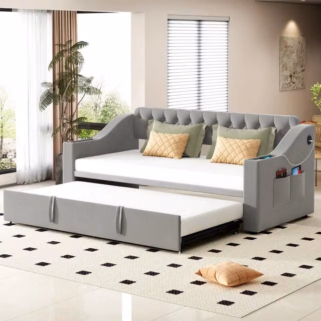 Letto divano singolo OKWISH in tessuto grigio con porte di ricarica USB, vani laterali e struttura in metallo, L/P/H: 90 x 190 x 54 cm