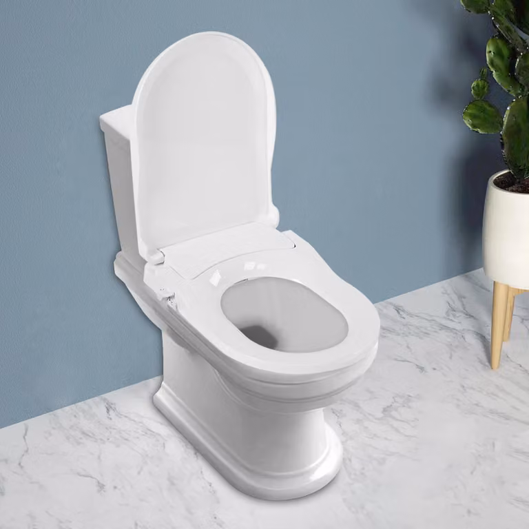 Sedile WC con bidet - Modello a D in PP - 2 ugelli (per la zona intima femminile + per il sedere) - 3 fori di getto - Distanza tra i fori 11,5–16,5 cm - Attacco 1,27 cm - Bianco